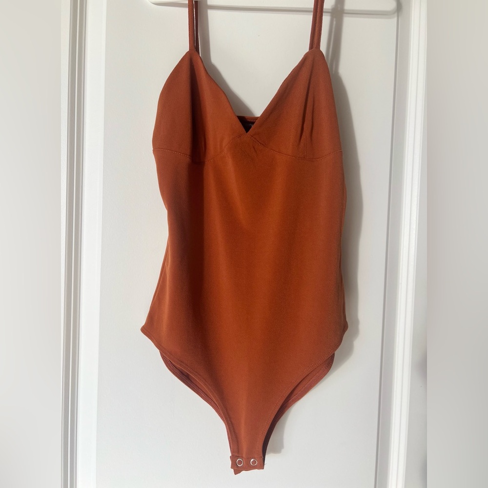 Forever 21 Bodysuit in Burnt Orange (size small)